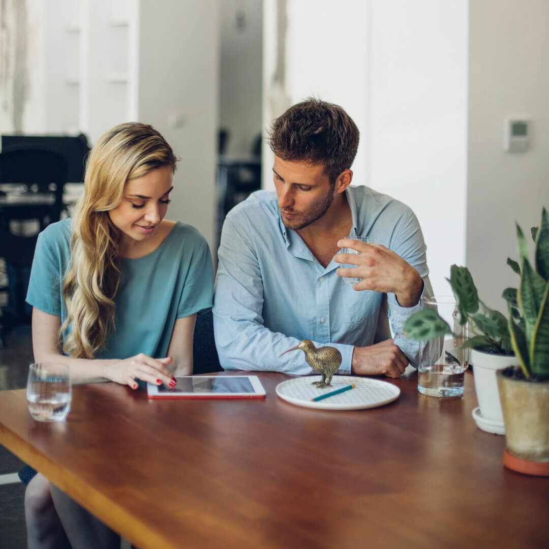 Couple reviewing finance optinos
